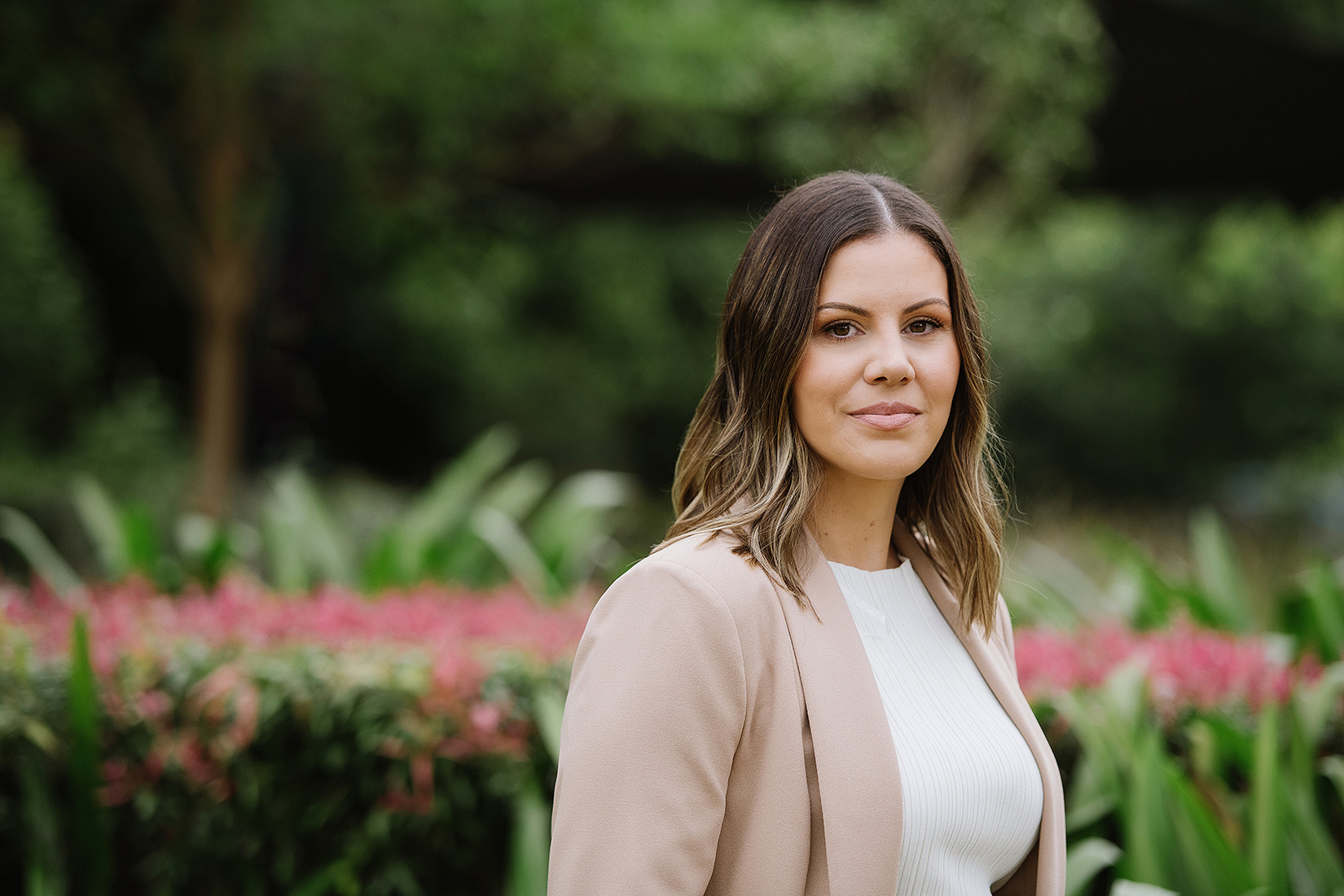 Professional Mortgage Broker Standing Outdoors With A Confident And Approachable Expression